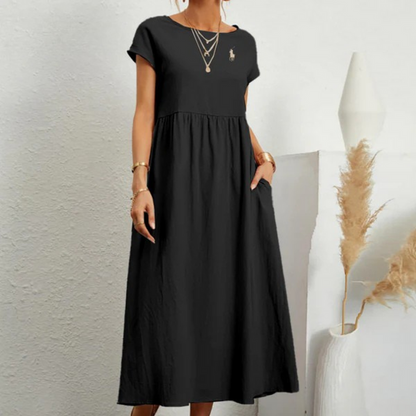 Vestido amplio de algodón y lino con pliegues
