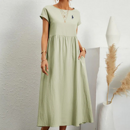 Vestido amplio de algodón y lino con pliegues