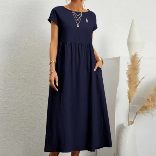 Vestido amplio de algodón y lino con pliegues